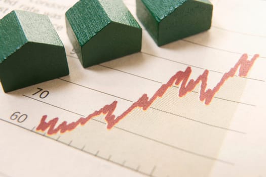 graph in a paper with wooden houses