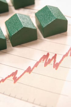 graph in a paper with wooden houses