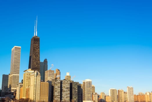 View of Chicago skyscrapers with a beautiful deep blue sky