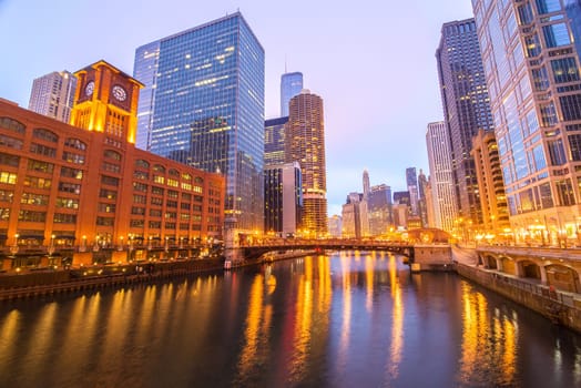 View of skyscrapers in downtown Chicago on either side of the Chicago River