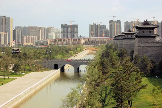 Seven high buildings undeemerging economy China is experiencing a construction boom, building ghost cities to push the economy.