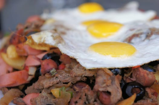 Fatty and unhealthy Chilean dish called Chorillana or Pichanga