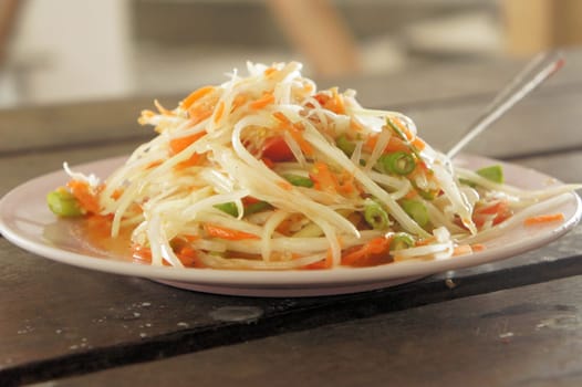 Spicy Green papaya salad Som Tam, Thai food