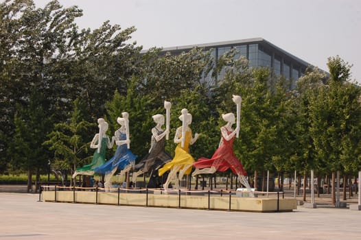 Statues of runners during Olympic torch relay in the bird's nest, Beijing, China