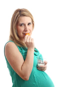 Details of a pregnant woman with a glass of milk and cheese isolated on white background.