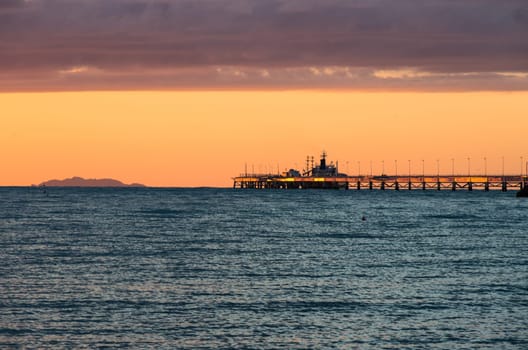 Sunset over a commercial dock mostly used to stock ethylene