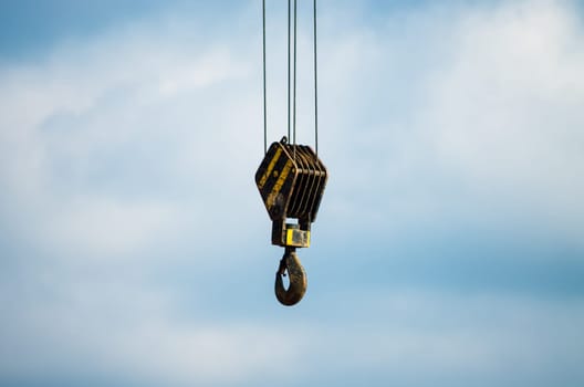 Red yellow crane hook working