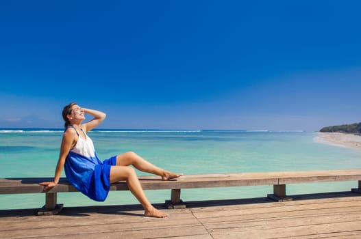 Beautiful woman relaxing on a beautiful tropical beach