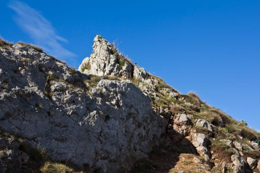 A rocky hill top on a sunny day