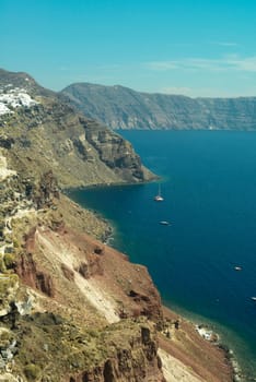 View on rock coastline on Santorini island, Greece.
