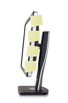Computer monitor with reminder notes, isolated on white background