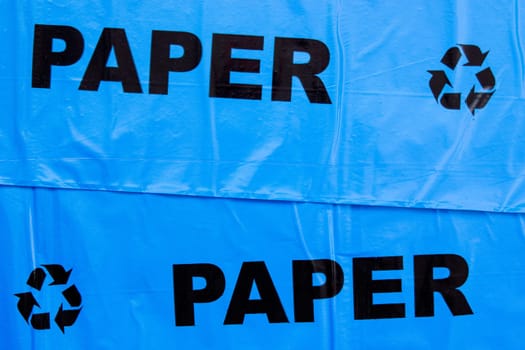Background of yellow garbage bags for recyclable paper