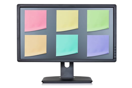 Computer monitor with color note papers , isolated on white background
