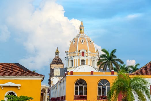 Dome of San Pedro church and historic colonial buildings in the center of Cartagena, Colombia