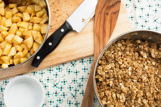 Ingredients and cooking utensils used for making apple crumble