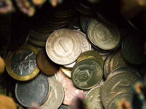 Different coins - old and new, from around the world.