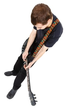 Man in black clothes with an electric guitar