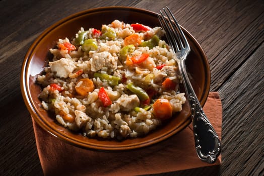 Chicken risotto with vegetables close up shoot