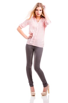 Beautiful and attractive fashion woman smiling and posing, isolated over white background