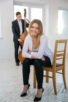 Beatiful young woman on chair smile on camera