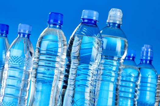 Composition with assorted plastic bottles of mineral water