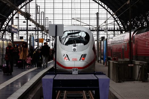 Frankfurt,Germany – December 19,2013: Travelers leave a Deutsche Bahn express train at Frankfurt Central Station on December 19,2013.