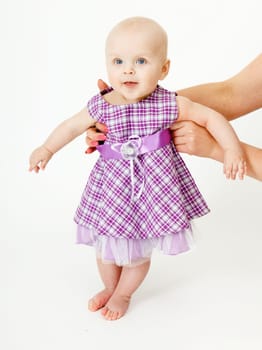 half-year-old beautiful baby girl mom supported