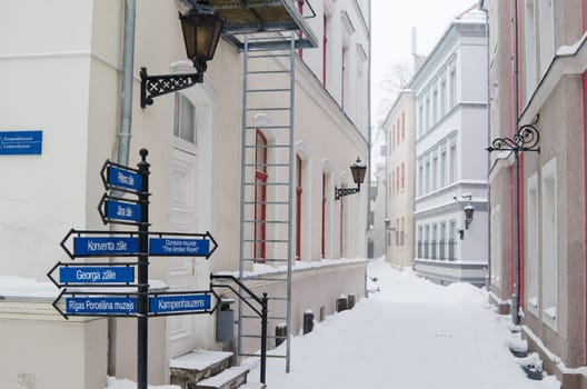 Street of Old Riga in snow day before Christmas