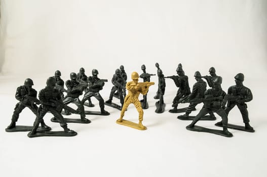 Plastic Lead Soldiers Representing War on a White Background