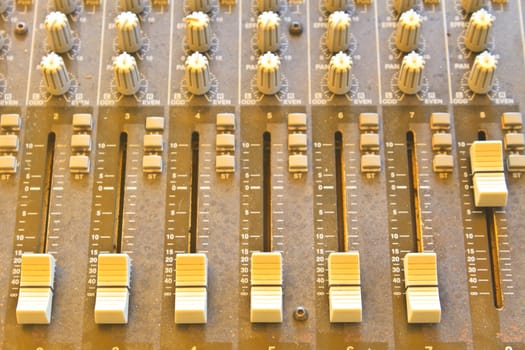 sound studio adjusting record equipment