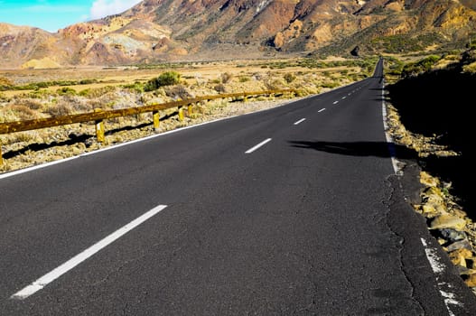 Desert Lonely Road Landscape in Volcan Teide National Park, Tenerife, Canary Island, Spain