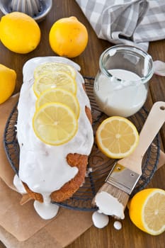Homemade Ruehrkuchen with frosting with lemons