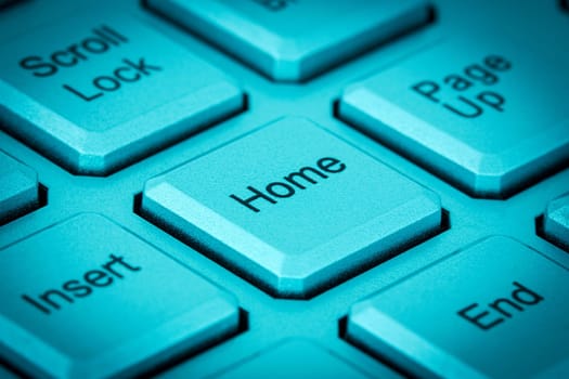 Home key on a keyboard in a blue tone