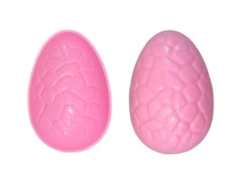 Easter egg moulds isolated against a plain background