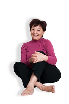 Portrait of smiling senior woman - isolated on white