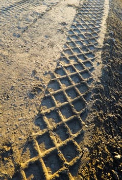 Tyre tread pattern in the ground