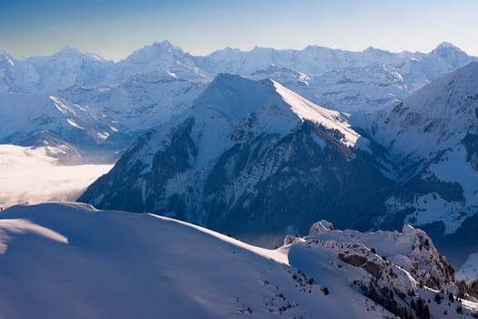 above the high fog with a view of the Niesen