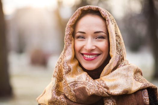 Smiling young and happy business woman wearing headscarf