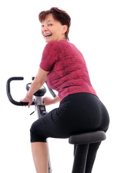 Spinning senior woman - back view