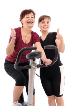 Spinning senior woman with coach