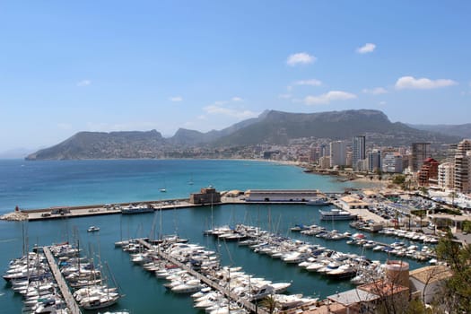 Panoramic view over Calp (Spain). Town bay beach