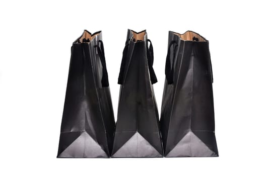 black paper bag isolated on white background
