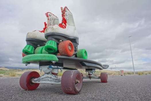 hdr picture of Vintage Style Longboard Black Skateboard on an Empty Asphalt Desert Road
