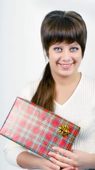 young attractive woman with beautiful packaged gift