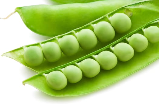 Fresh green peas isolated on white background