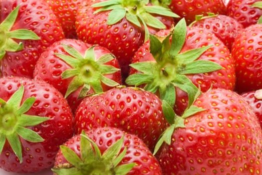 Red sweet strawberries making nice edible background