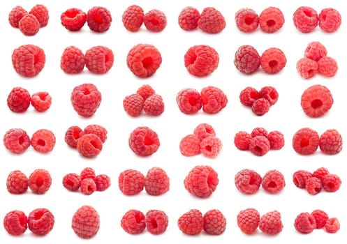 Collection of ripe red raspberries isolated on white background