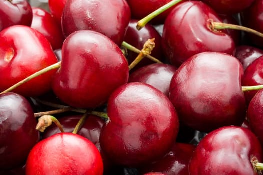 Beautiful red fresh cherry macro photo background