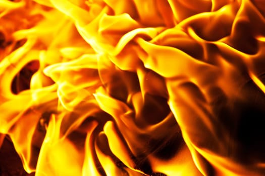 Beautiful yellow and orange hot fire on black background