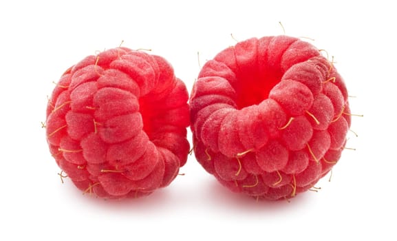 Ripe red raspberries isolated on white background